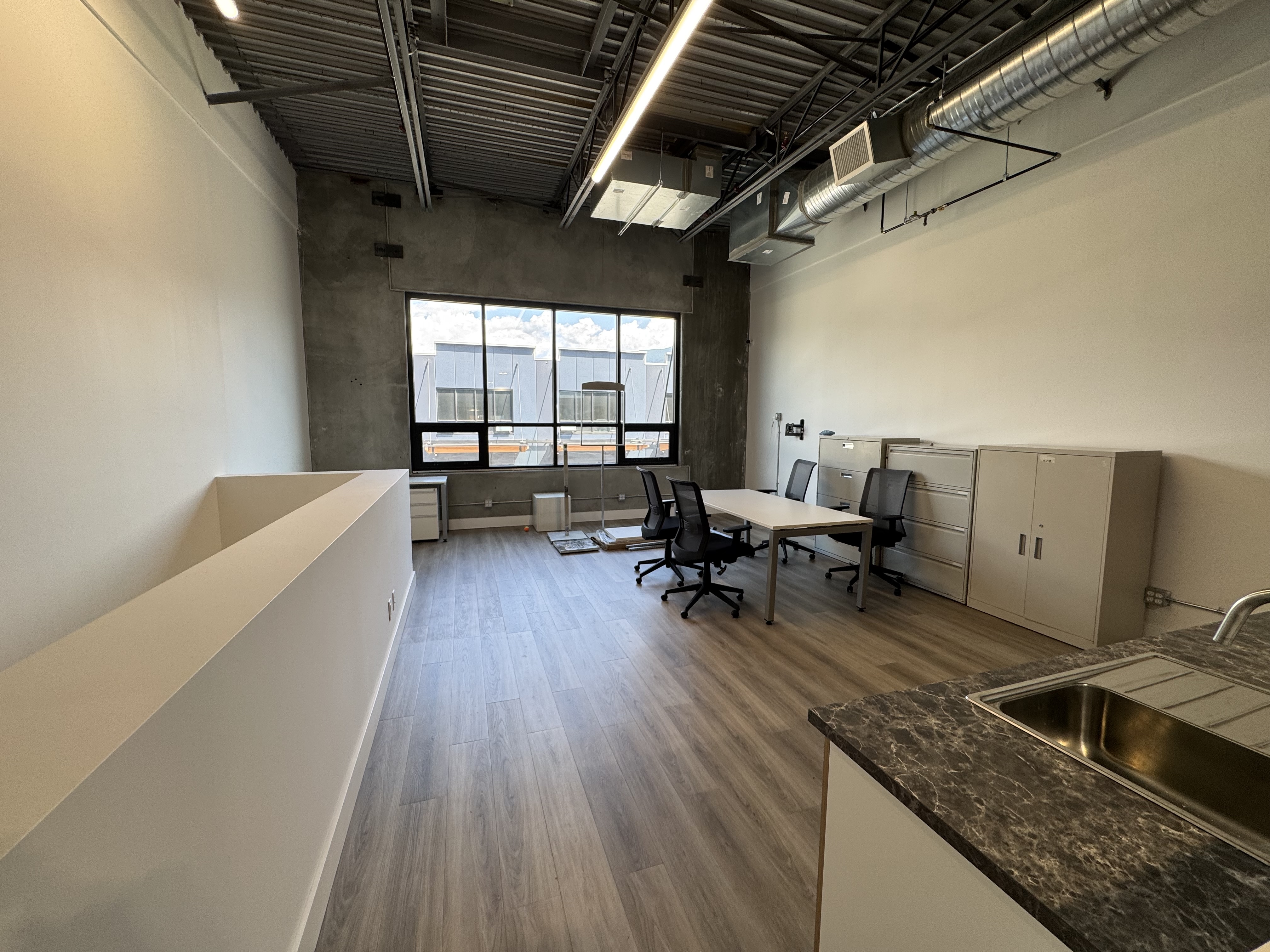 Aabluo soap factory build-out with industrial machinery and fire suppression systems.