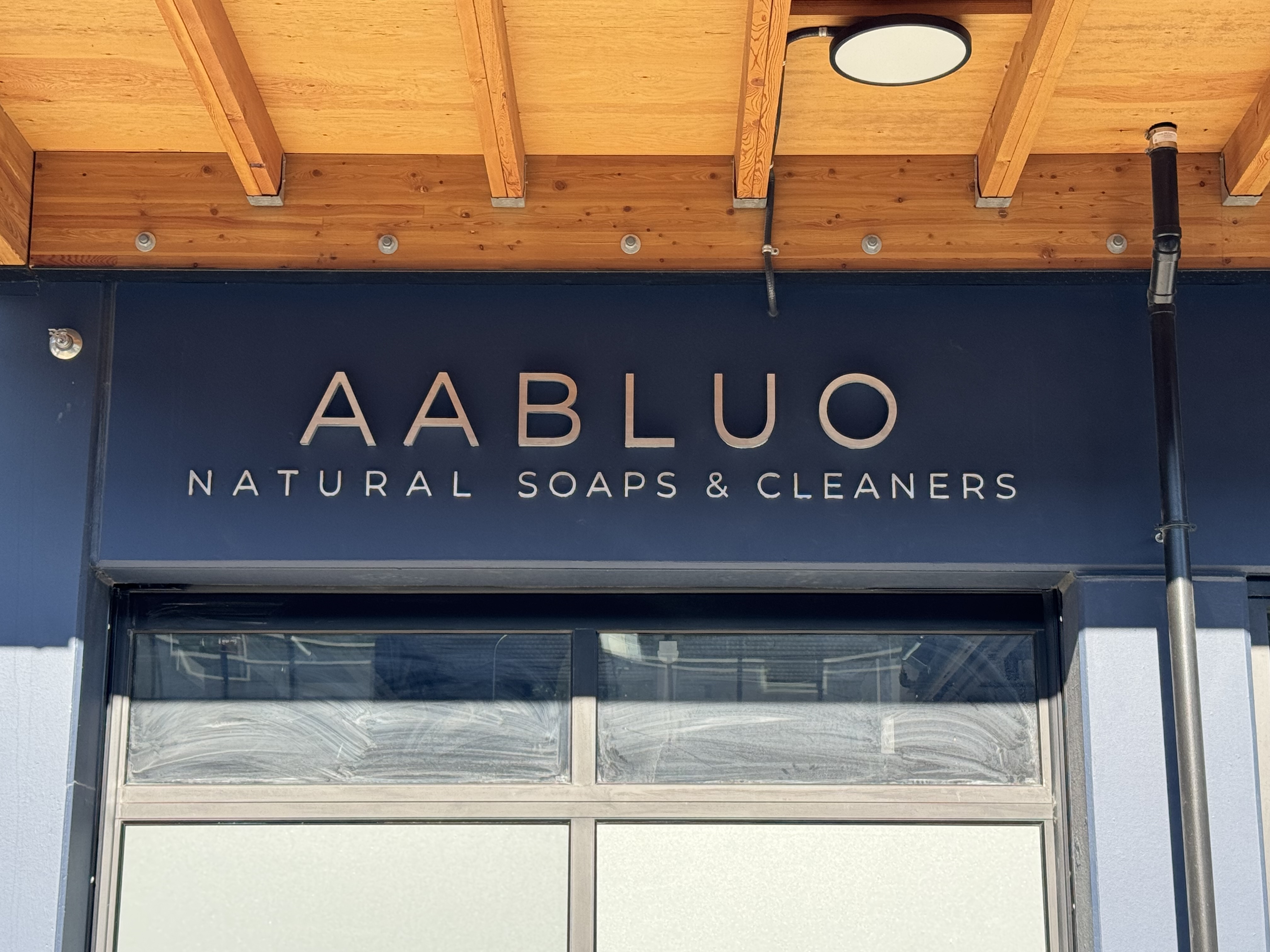 Aabluo soap factory build-out with industrial machinery and fire suppression systems.